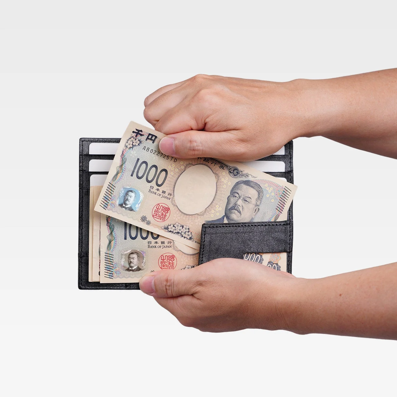 お金、日本円、紙幣、1000円札、財布、現金、手、金融、支払い、節約、出費