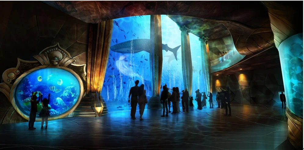 水槽で海洋生物を鑑賞する人々