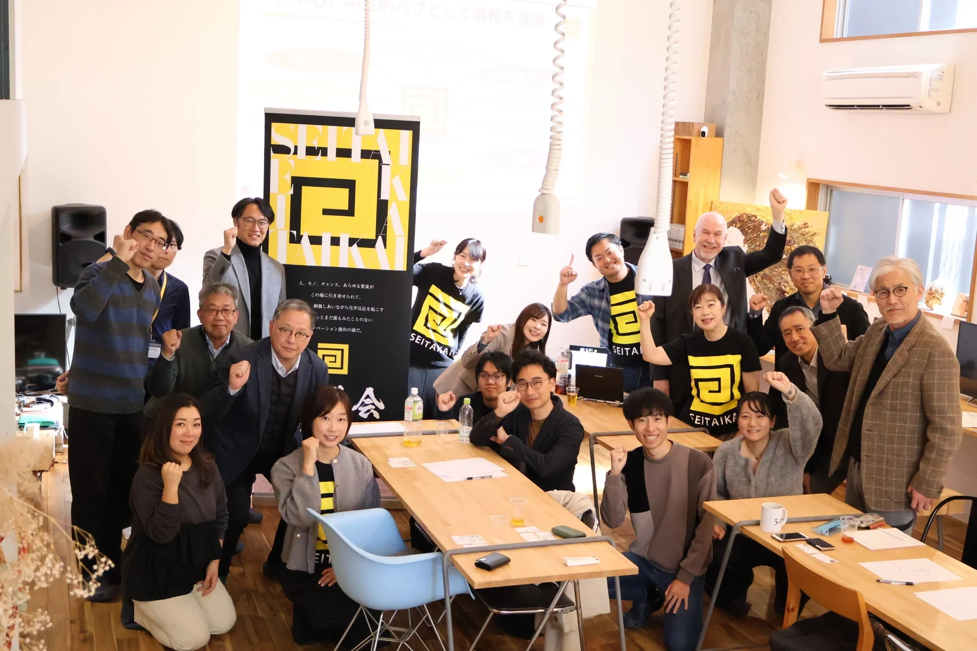 寄付者100名達成報告会の様子