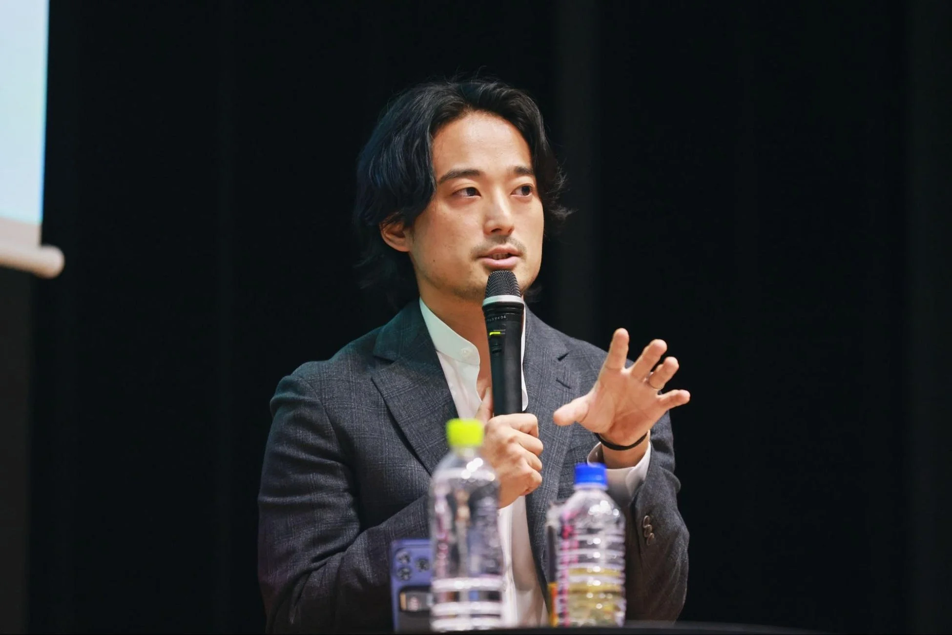 講演中の木内翔大氏