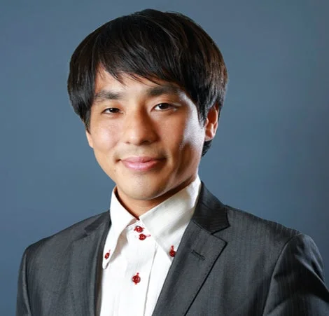 小村 淳己氏のポートレート